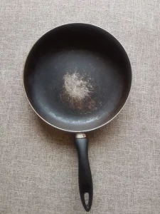 how to make a ceramic pan non-stick again