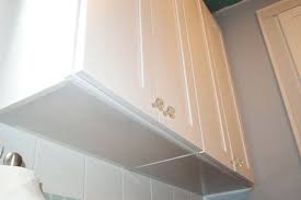What Are the Considerations When Finishing the Underside of Kitchen Cabinets